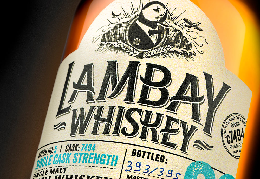 
                  
                    Laden Sie das Bild in den Galerie-Viewer, Close up image of Lambay Whiskey bottle packaging logo. 
                  
                